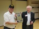 DARA President Don Dubon, N6JRL, presents the “Outstanding Career and Service to Amateur Radio” award to ARRL CEO David Sumner, K1ZZ.